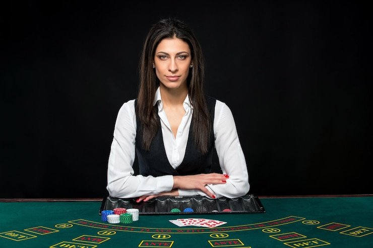 Professional live casino studio with dealer managing authentic table game